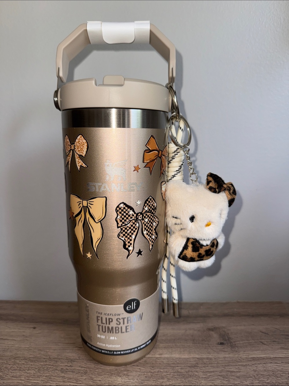 Stanley Metallic Gold Flip Straw Tumbler with Bow Decals and Plush Keychain